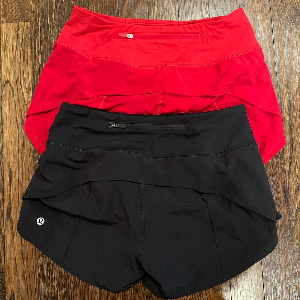 2 pairs of Lululemon speed up shorts, mid rise, 4 inch, size 4, red and black